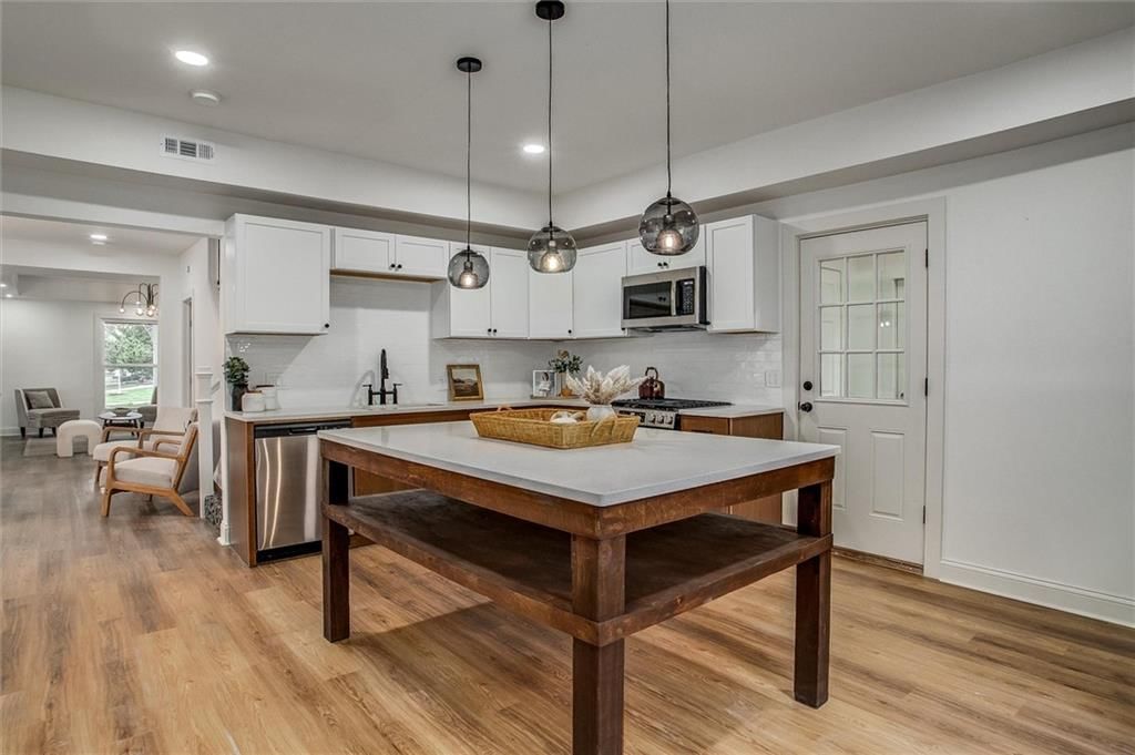 Open floor plan at 24050 W 55th Street, Shawnee, KS 66226
