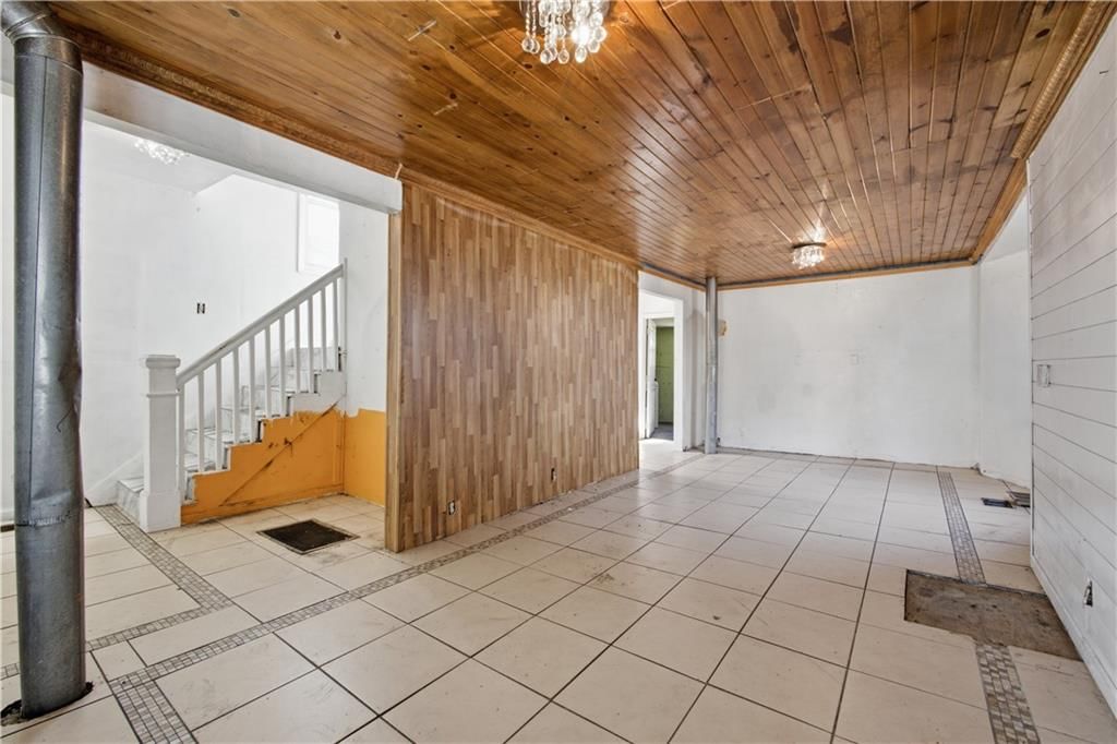 Tile floors and white walls at 2316 Early Street, Kansas City, KS 66103