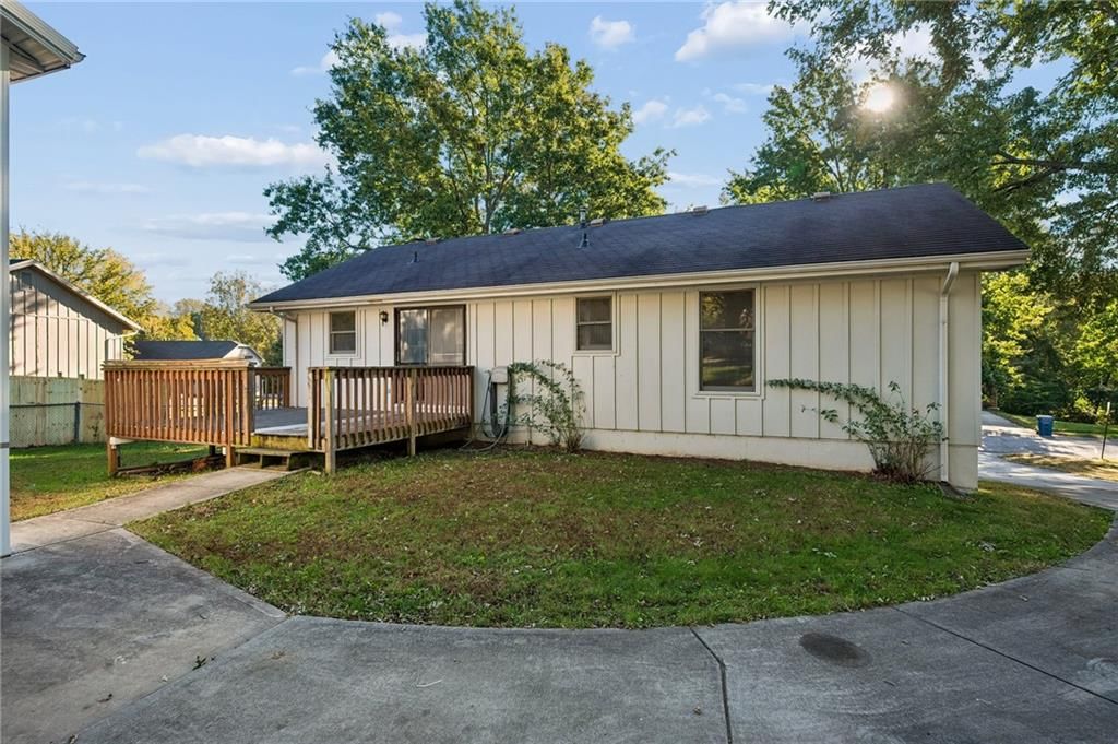 Deck and fenced yard at 6906 N CHAS Drive, Pleasant Valley, MO 64068