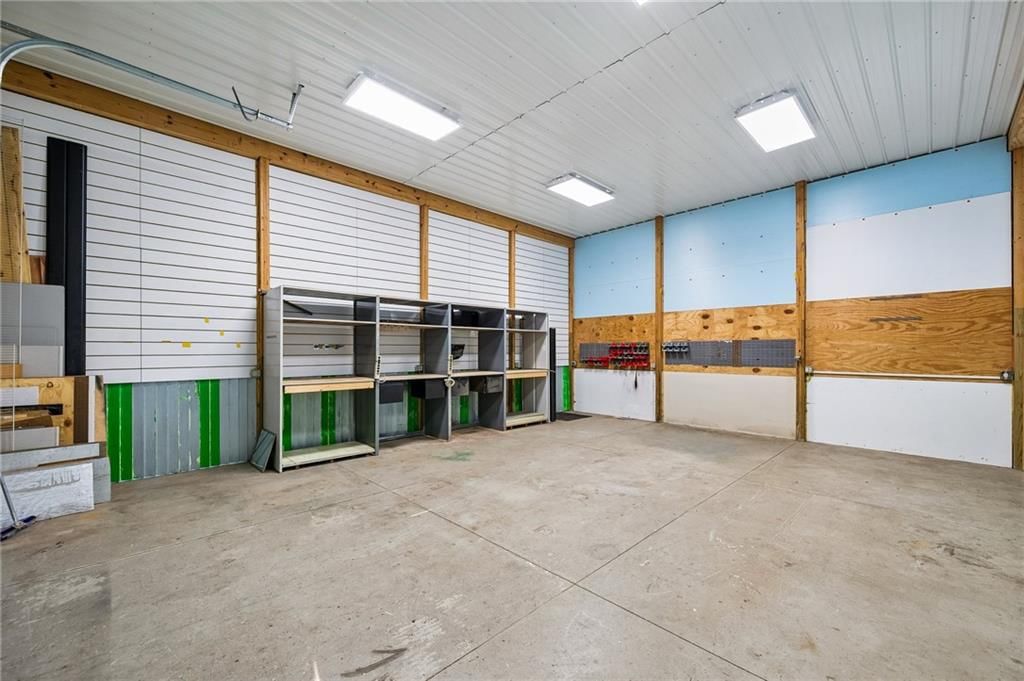 Workshop and garage storage system at 6906 N CHAS Drive, Pleasant Valley, MO 64068