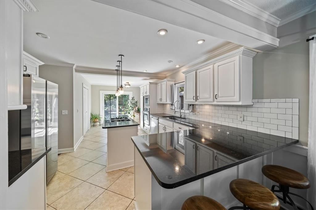 Photo 16 of 53 - 211 E 66TH Street, Kansas City, MO 64113