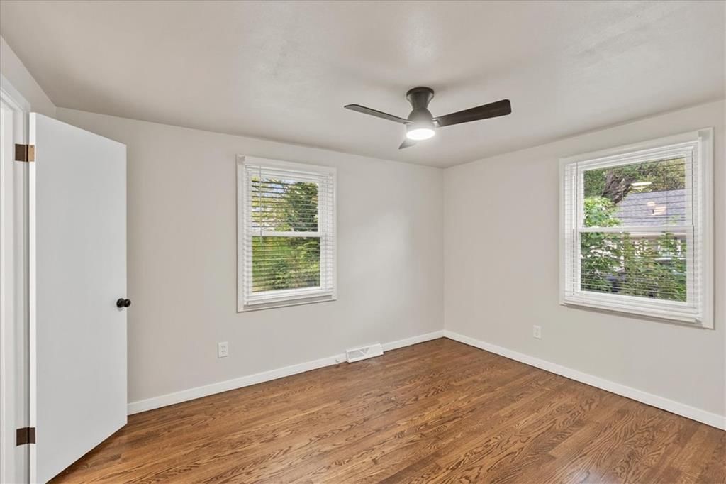 Main-floor primary bedroom at 5400 Outlook Street, Mission, KS 66202