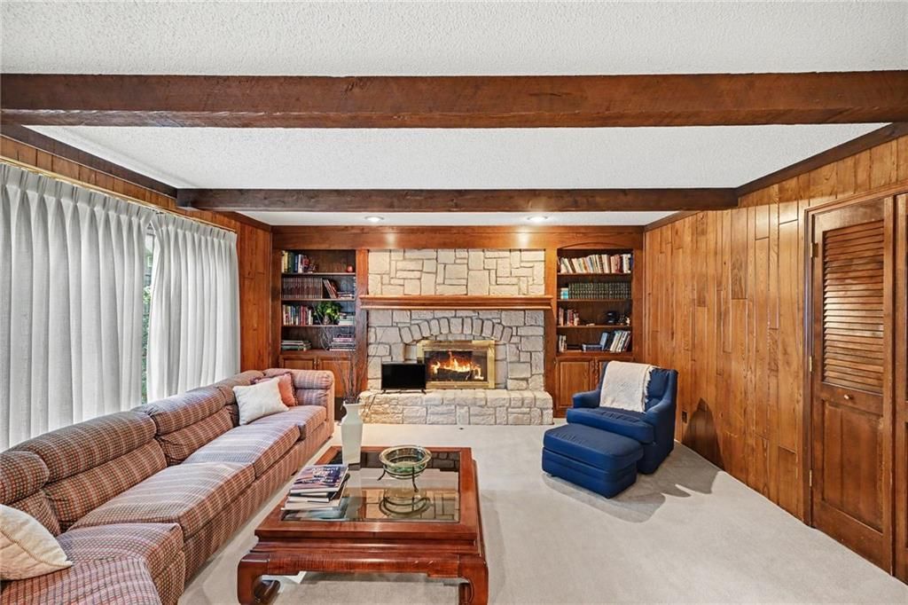 Fireplace, ceiling beams and recessed lighting at 2305 W 120th Terrace, Leawood, KS 66209