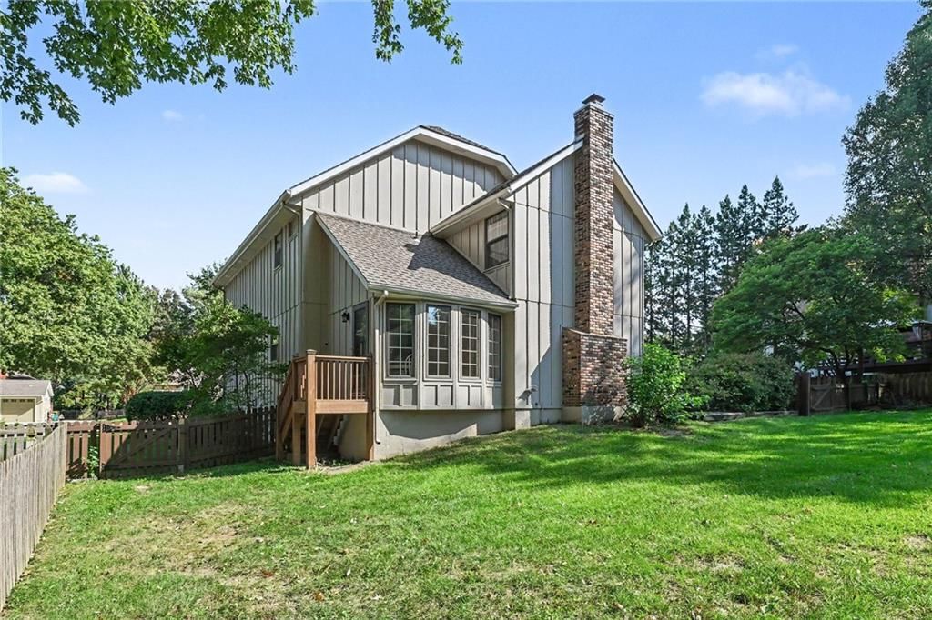Deck, big backyard and fenced yard at 2305 W 120th Terrace, Leawood, KS 66209