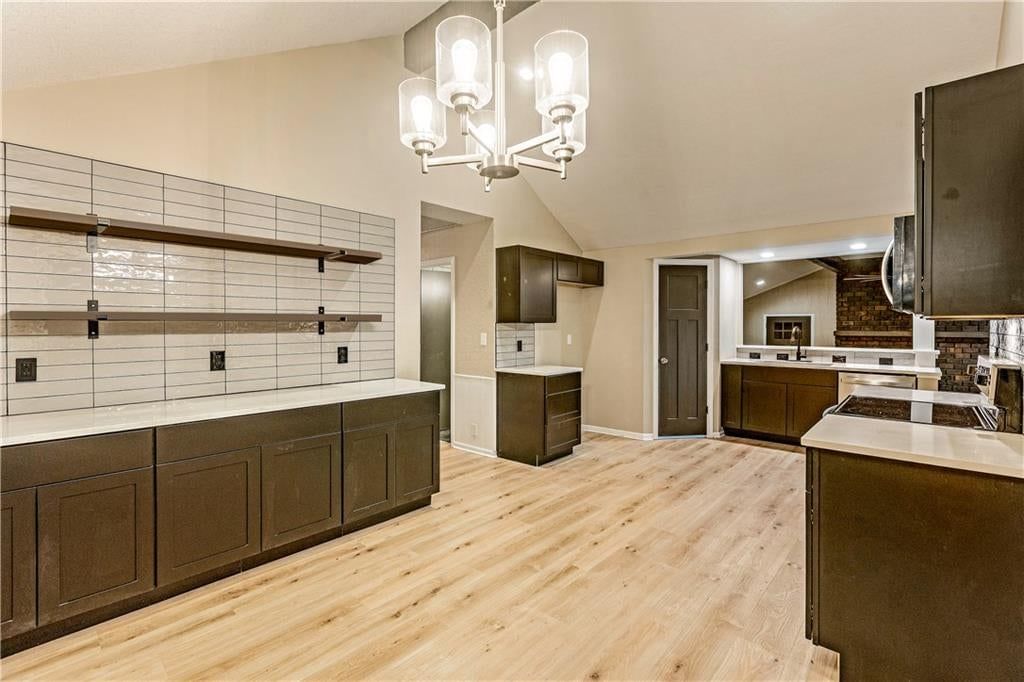 Open floor plan, stainless steel appliances and updated kitchen at 2712 S Sante Fe Road, Independence, MO 64052