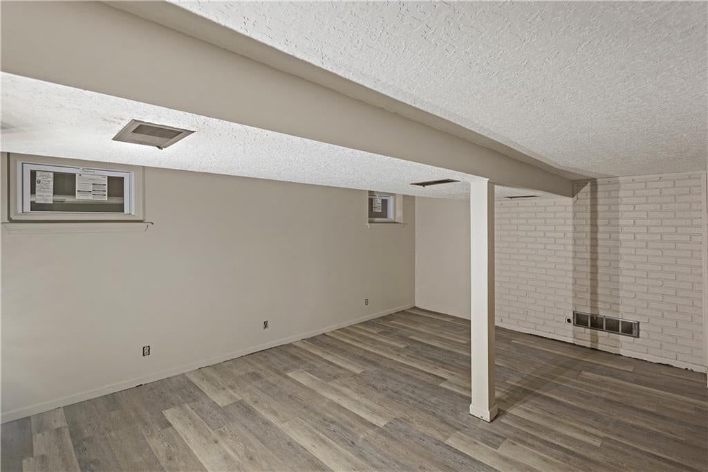 Finished basement and staircase at 2712 S Sante Fe Road, Independence, MO 64052