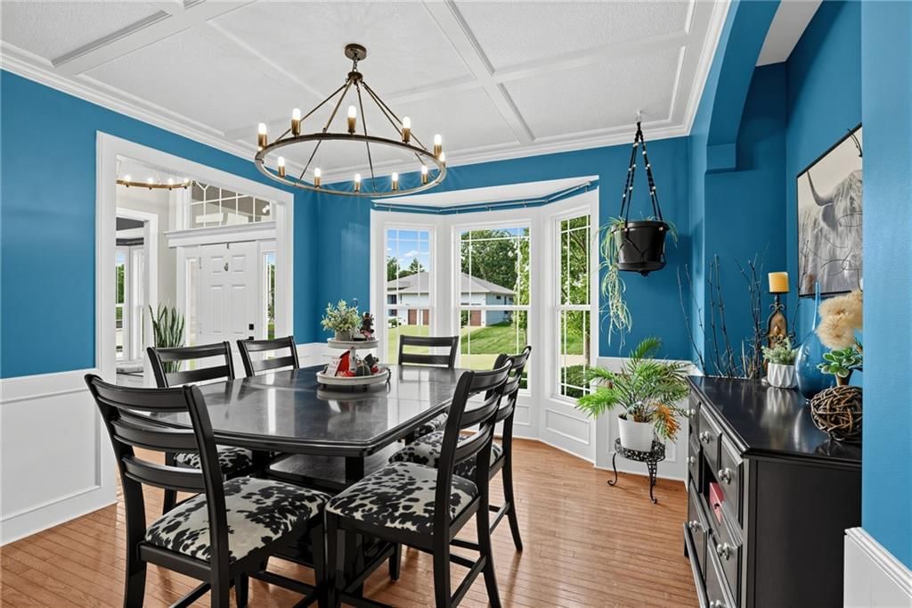 Statement lighting, wainscoting or board and batten and coffered ceiling at 5023 Haskins Street, Shawnee, KS 66216