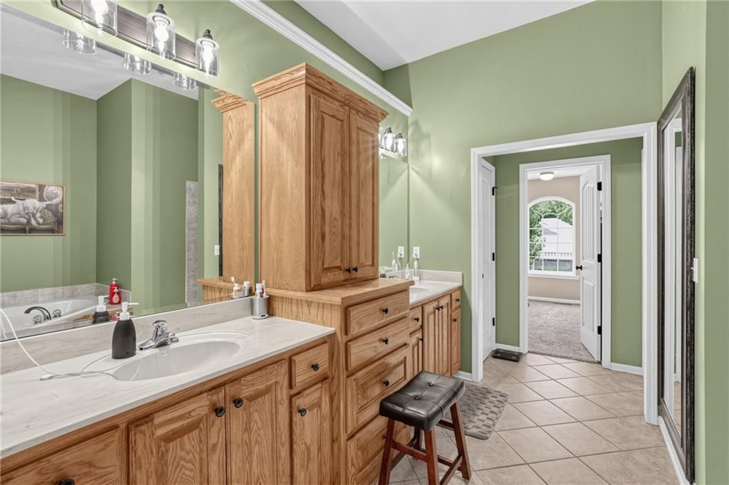 Double vanity and wood vanity at 5023 Haskins Street, Shawnee, KS 66216