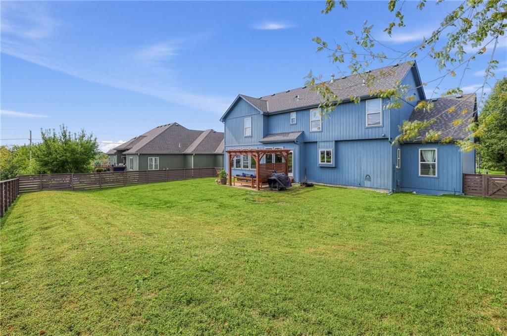 Big backyard, pergola and fenced yard at 5023 Haskins Street, Shawnee, KS 66216
