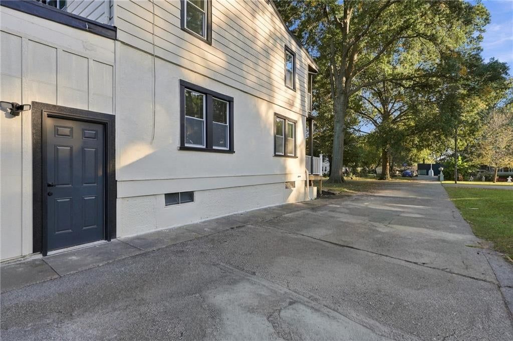 Deck, big backyard and fenced yard at 9358 E 64th Terrace, Raytown, MO 64133