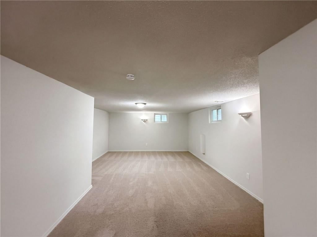 Finished basement and staircase at 11214 E 48th Street, Kansas City, MO 64133