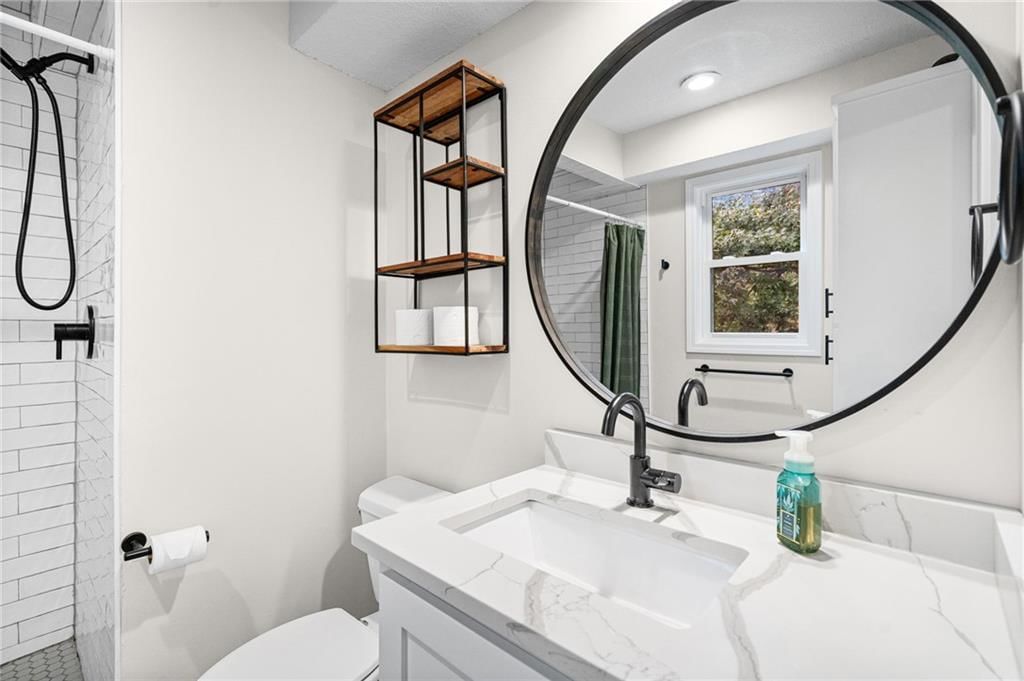 Walk-in shower and tiled shower at 10324 Rosehill Road, Overland Park, KS 66215
