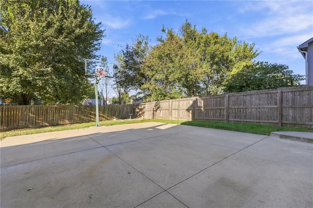 Concrete patio and basketball hoop at 372 W Madison Street, Gardner, KS 66030