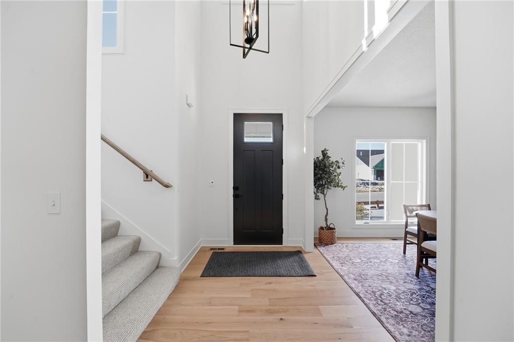 Staircase and black hardware at 18330 W 195th Street, Spring Hill, KS 66083