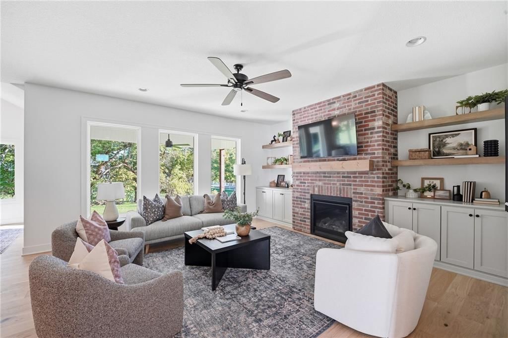 Fireplace and exposed brick wall at 18330 W 195th Street, Spring Hill, KS 66083