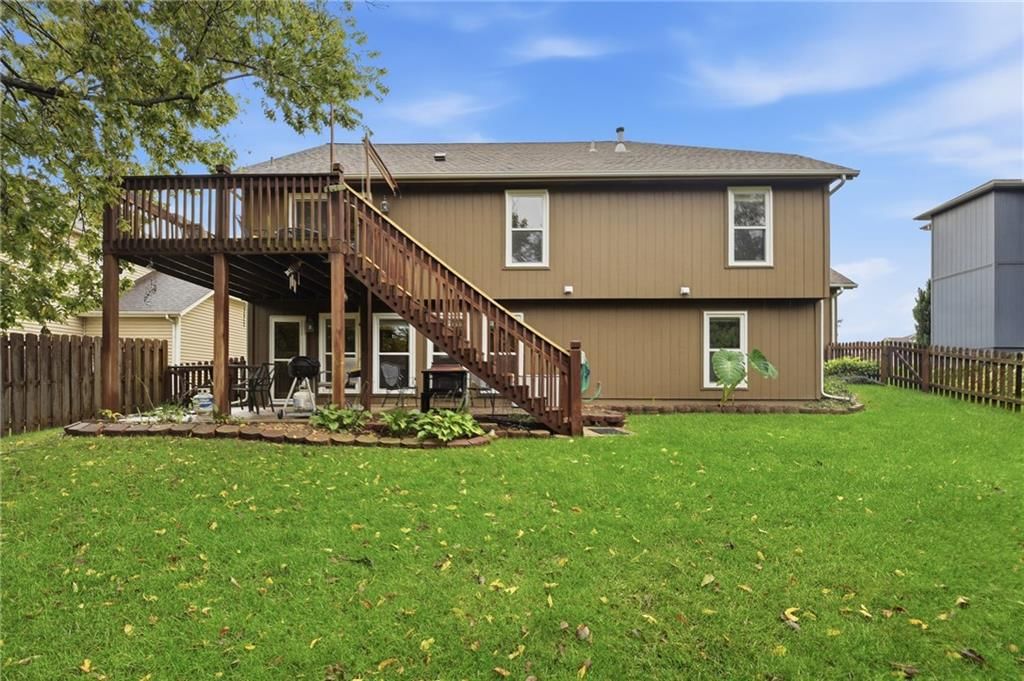Covered patio and concrete patio at 2252 SW Morris Drive, Lee's Summit, MO 64082