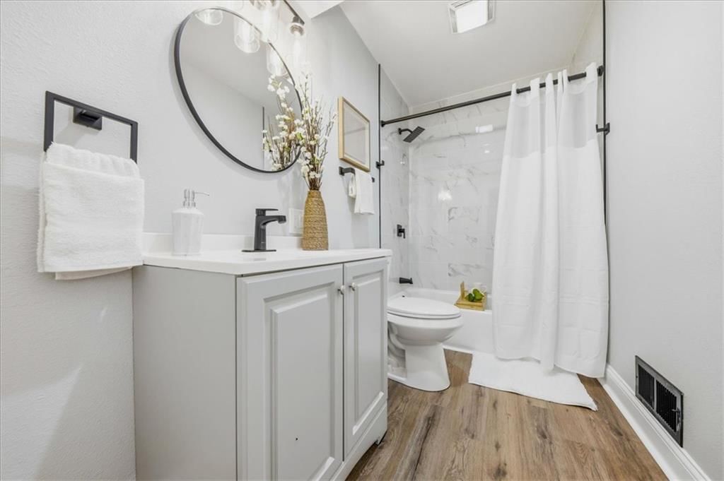 Tiled shower at 8520 Larsen Street, Overland Park, KS 66214