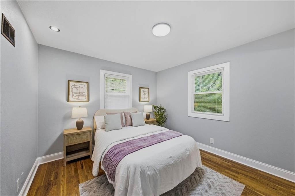 Main-floor primary bedroom at 8520 Larsen Street, Overland Park, KS 66214
