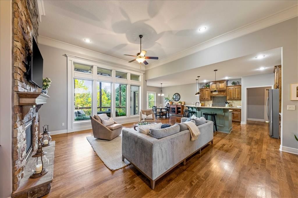 Tall ceilings, open floor plan and wall of windows at 15096 NW 66th Street, Parkville, MO 64152