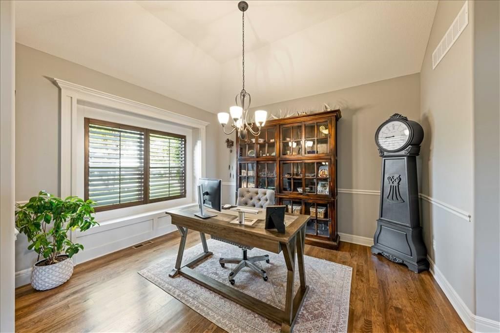Home office, statement lighting and wainscoting or board and batten at 15096 NW 66th Street, Parkville, MO 64152