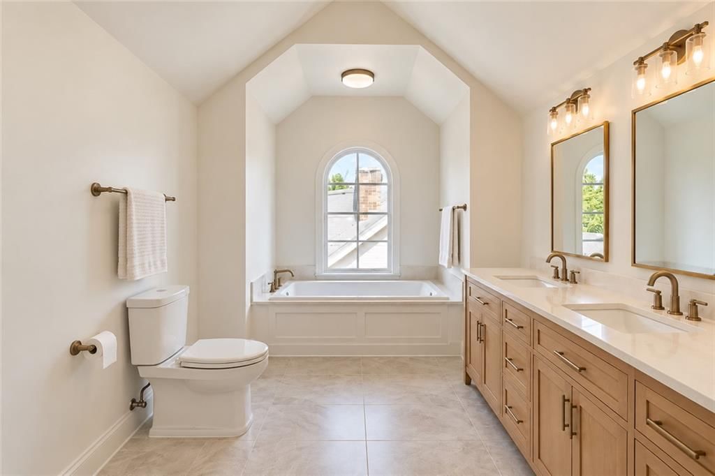 Double vanity and wood vanity at 5007 Lydia Avenue, Kansas City, MO 64110