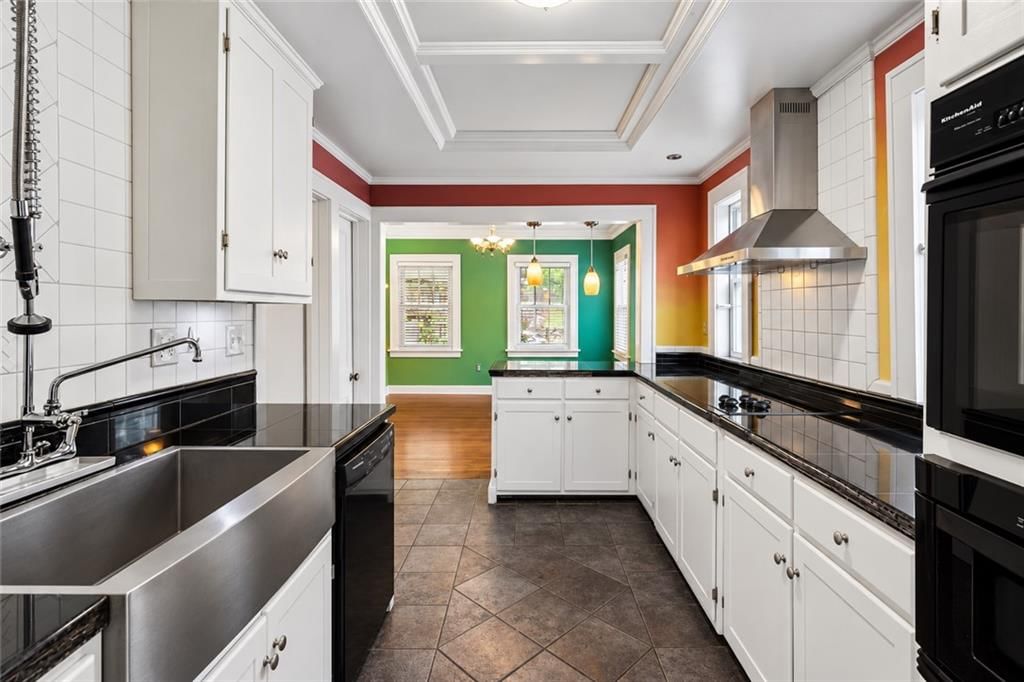 White kitchen, kitchen backsplash and subway tile backsplash at 5007 Lydia Avenue, Kansas City, MO 64110