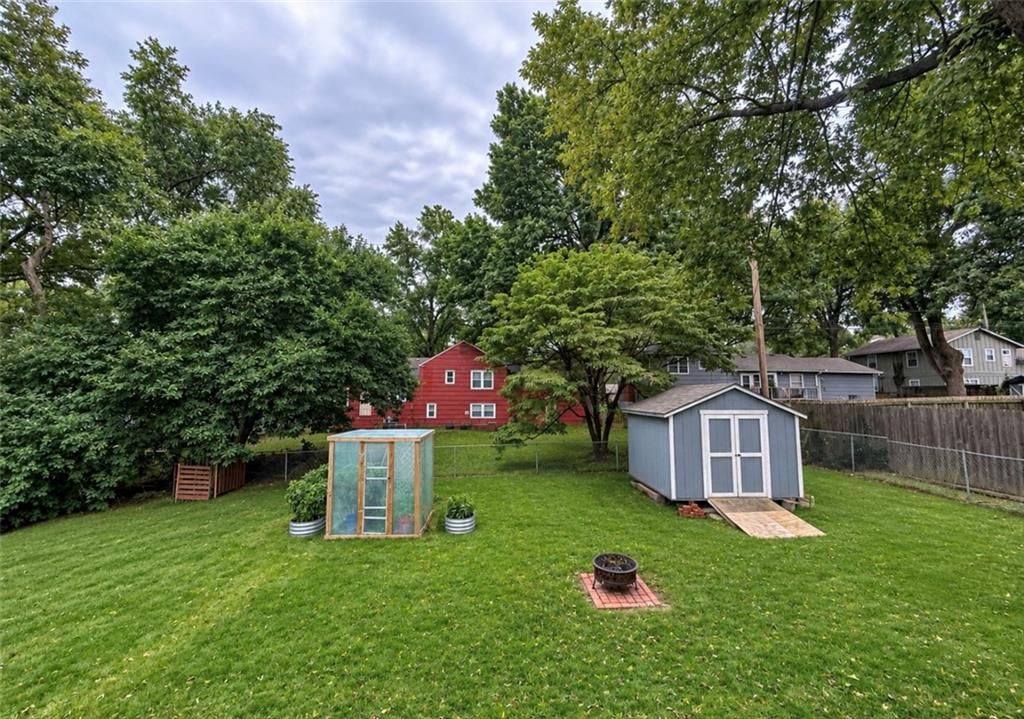 Big backyard, fenced yard and mature trees at 12807 E 39th Terrace S, Independence, MO 64055