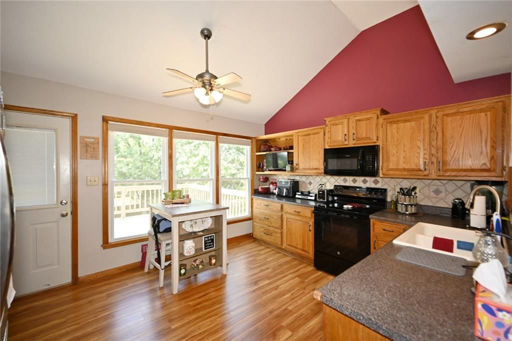 Kitchen island and accent wall at 8516 N Winan Avenue, Kansas City, MO 64153