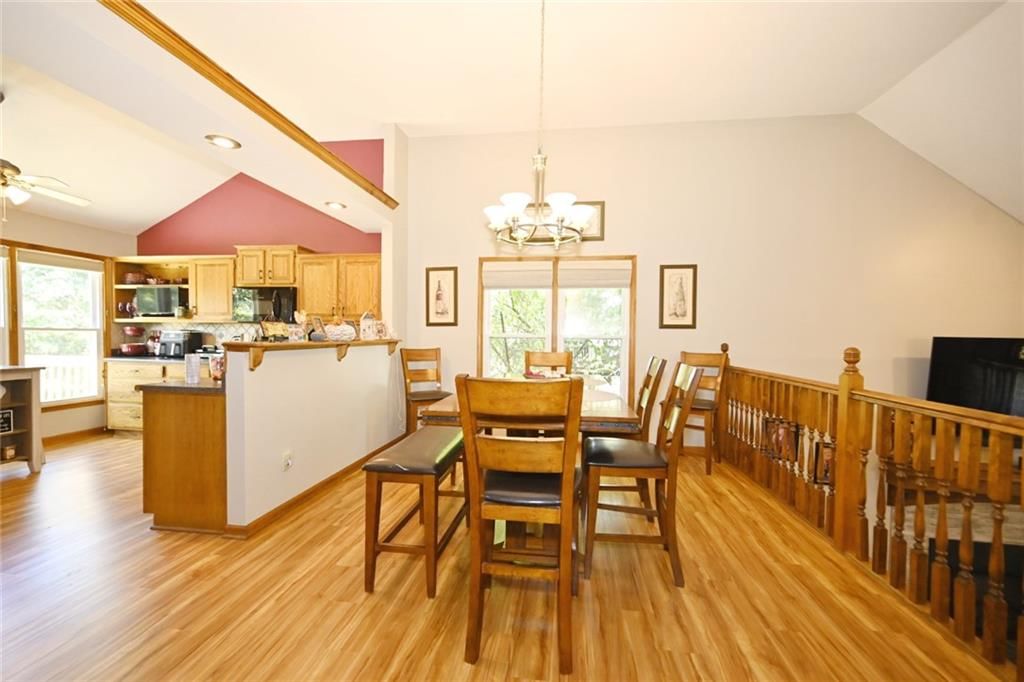 Statement lighting and breakfast nook at 8516 N Winan Avenue, Kansas City, MO 64153