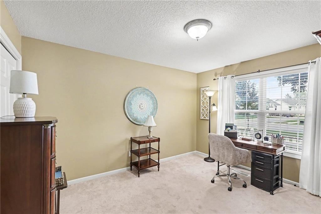 Home office and carpet at 3213 Devonshire Drive, Platte City, MO 64079