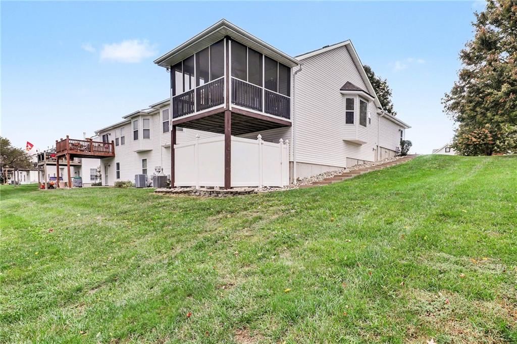 Mature trees and flat lot at 3213 Devonshire Drive, Platte City, MO 64079