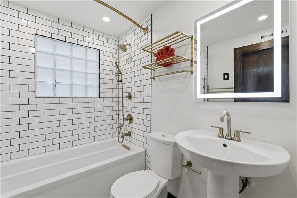 Renovated bathrooms at 7516 Locust Street, Kansas City, MO 64131