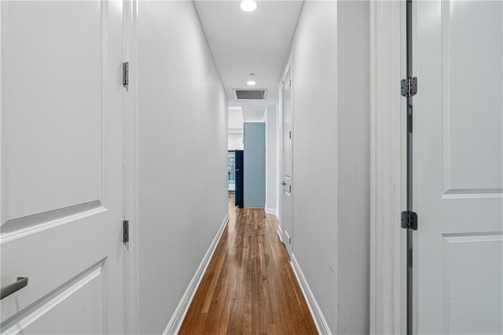 Hardwood floors and white trim at 1101 Walnut Street #907, Kansas City, MO 64106