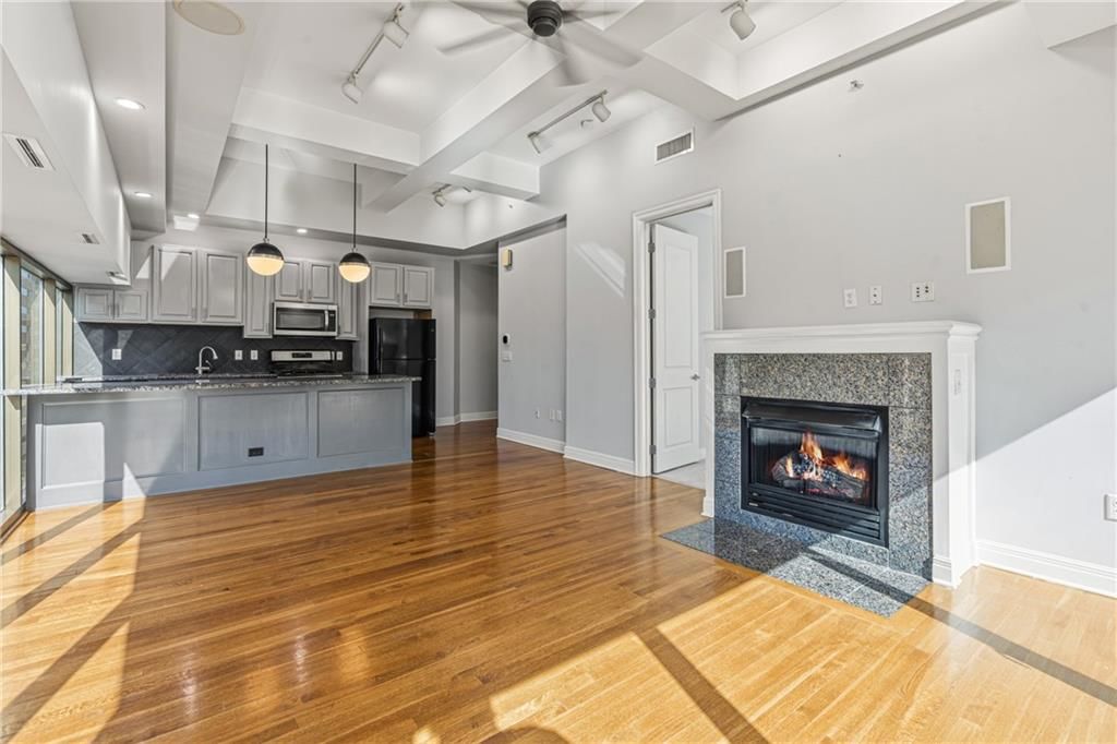 Tall ceilings, fireplace and coffered ceiling at 1101 Walnut Street #907, Kansas City, MO 64106