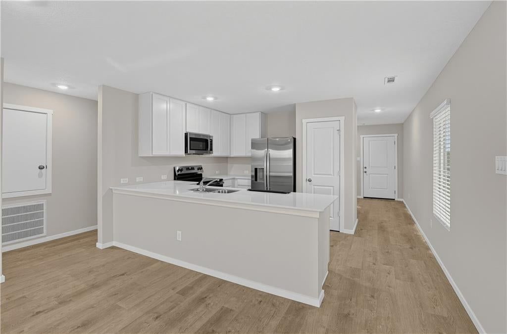 Open floor plan at 38011 W 207th Terrace, Edgerton, KS 66021