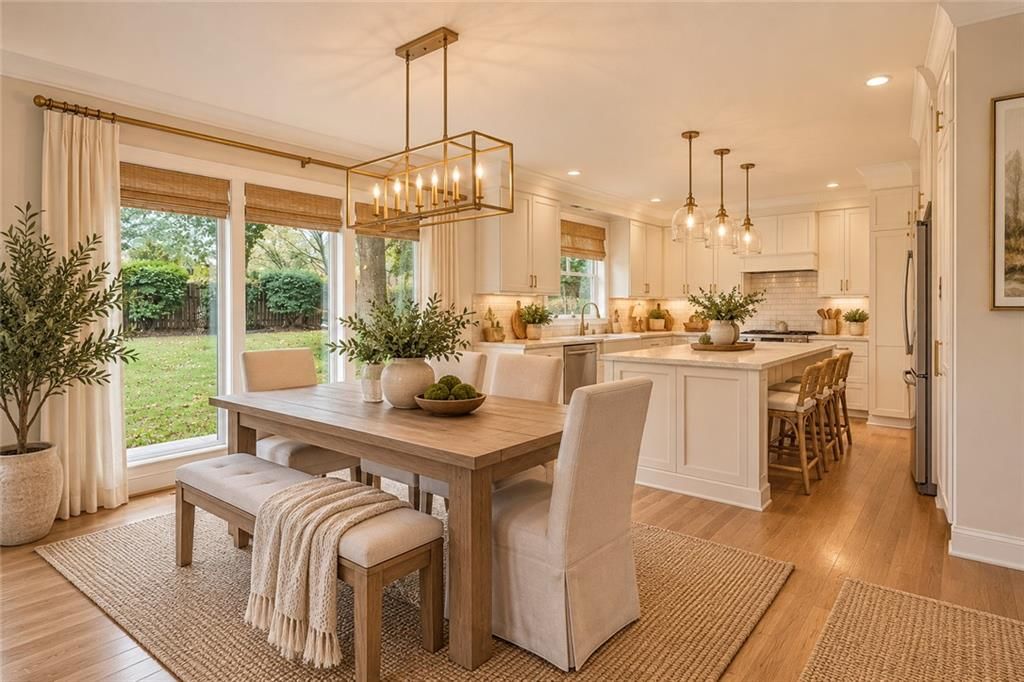 Kitchen island, white kitchen and quartz counters at 15821 Horton Court, Overland Park, KS 66223