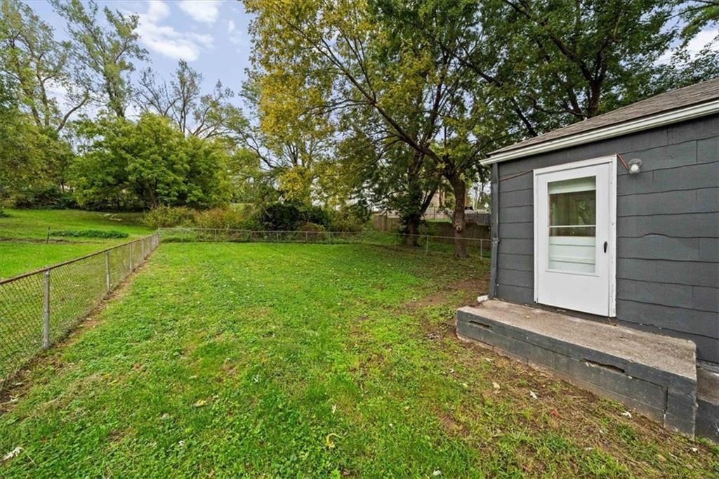 Fenced yard and chain-link fence at 11503 HACKETT Street, Sugar Creek, MO 64054