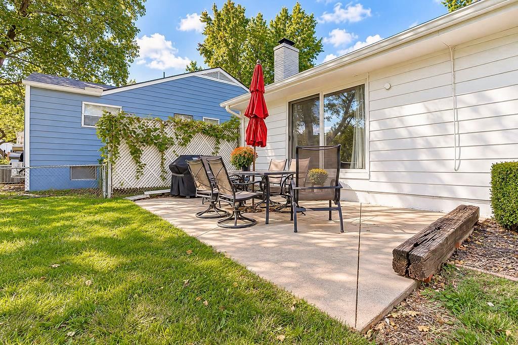 Fenced yard and concrete patio at 3109 W 79th Terrace, Prairie Village, KS 66208