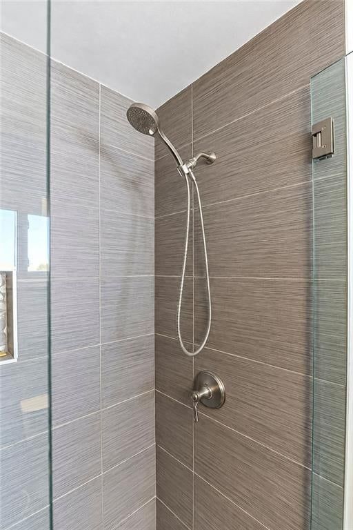 Walk-in shower, tiled shower and frameless glass shower at 3109 W 79th Terrace, Prairie Village, KS 66208