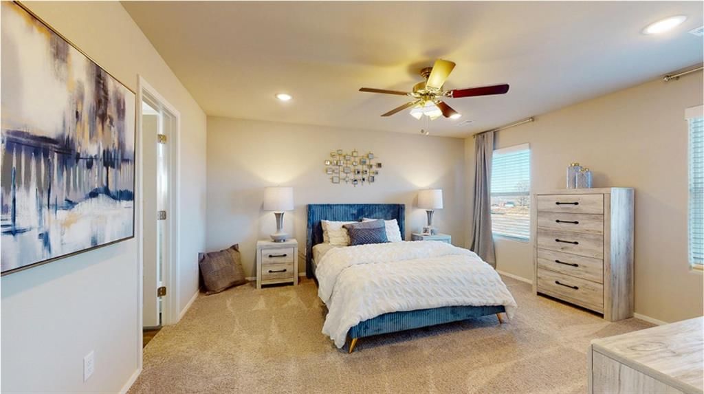 Walk-in closet and carpet at 701 SW 6th Terrace, Oak Grove, MO 64075
