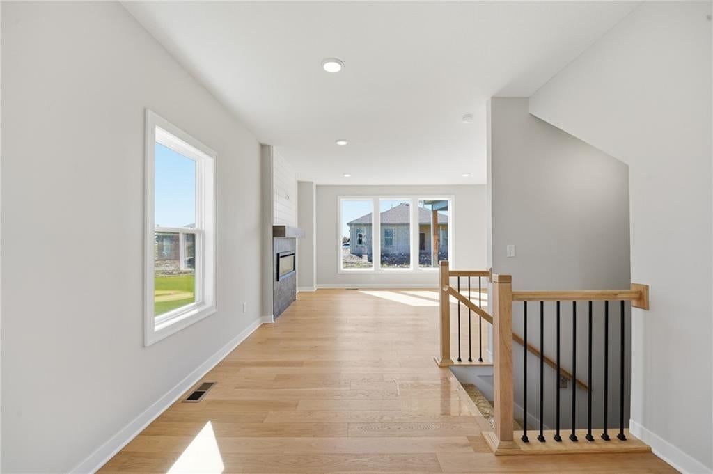 Hardwood floors and recessed lighting at 18455 W 195th Street, Spring Hill, KS 66083