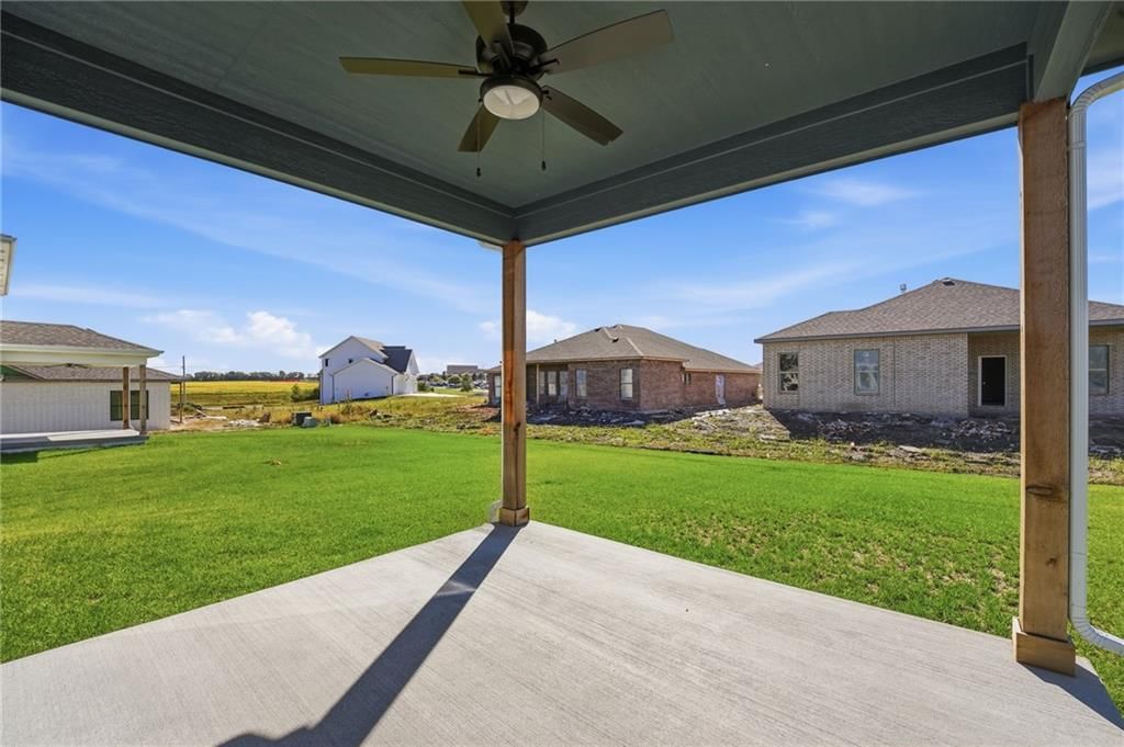 Covered patio and concrete patio at 18455 W 195th Street, Spring Hill, KS 66083