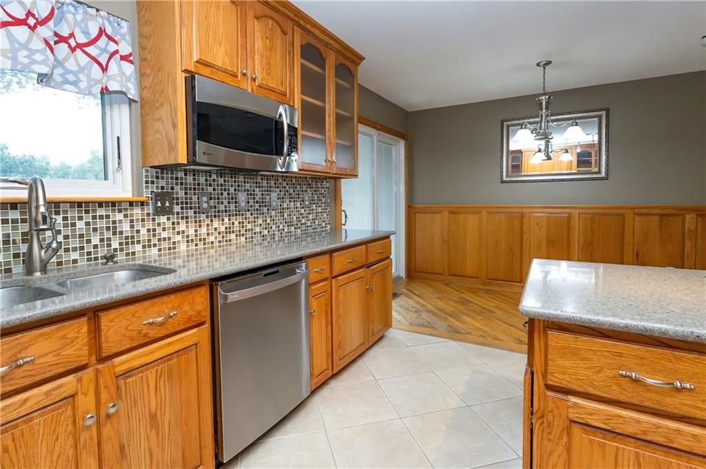 Wainscoting or board and batten and breakfast nook at 140 Debra Street, Lansing, KS 66043