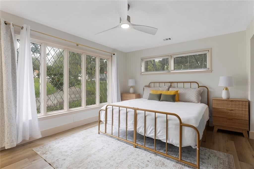 Main-floor primary bedroom at 9730 State Line Road, Leawood, KS 66206