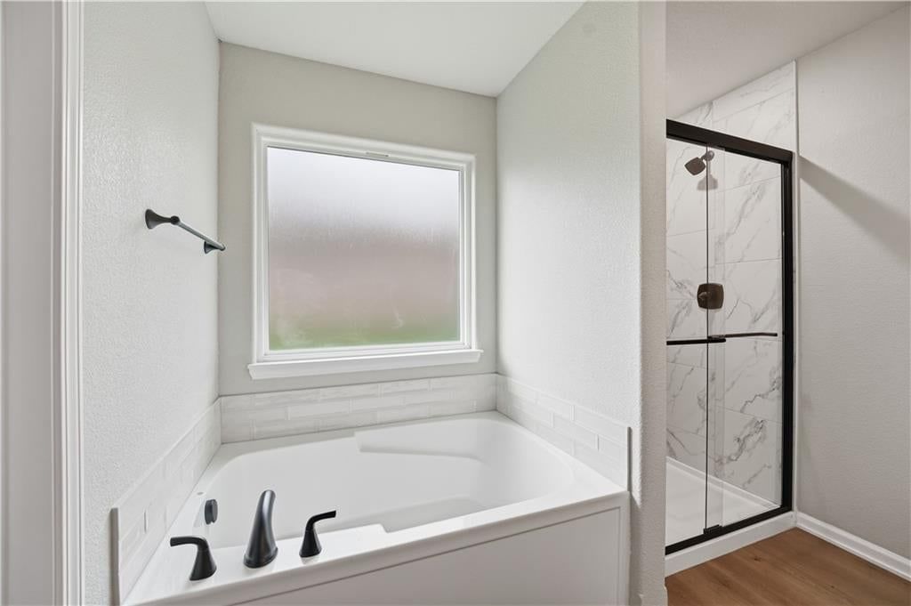 Walk-in shower, tiled shower and frameless glass shower at 18420 W 195th Street, Spring Hill, KS 66083