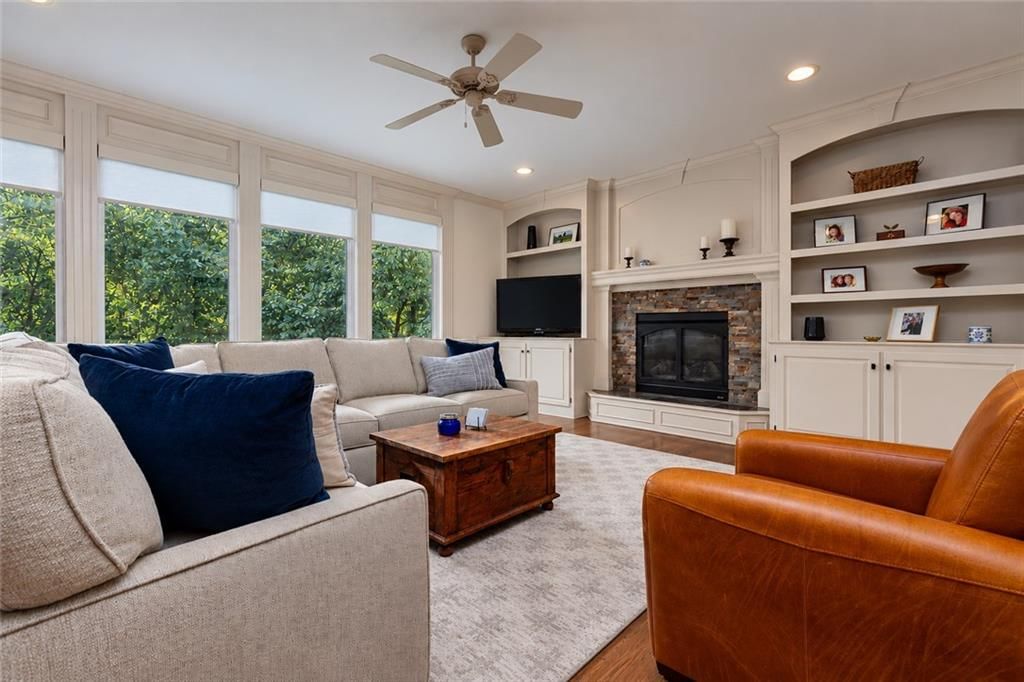 Stone fireplace and built-ins at 10245 Magnolia Lane, Parkville, MO 64152