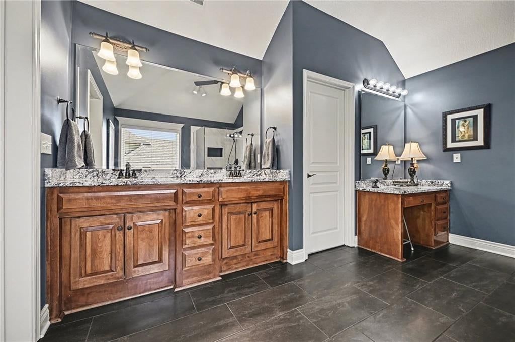 Double vanity and wood vanity at 10139 N Montgall Avenue, Kansas City, MO 64155