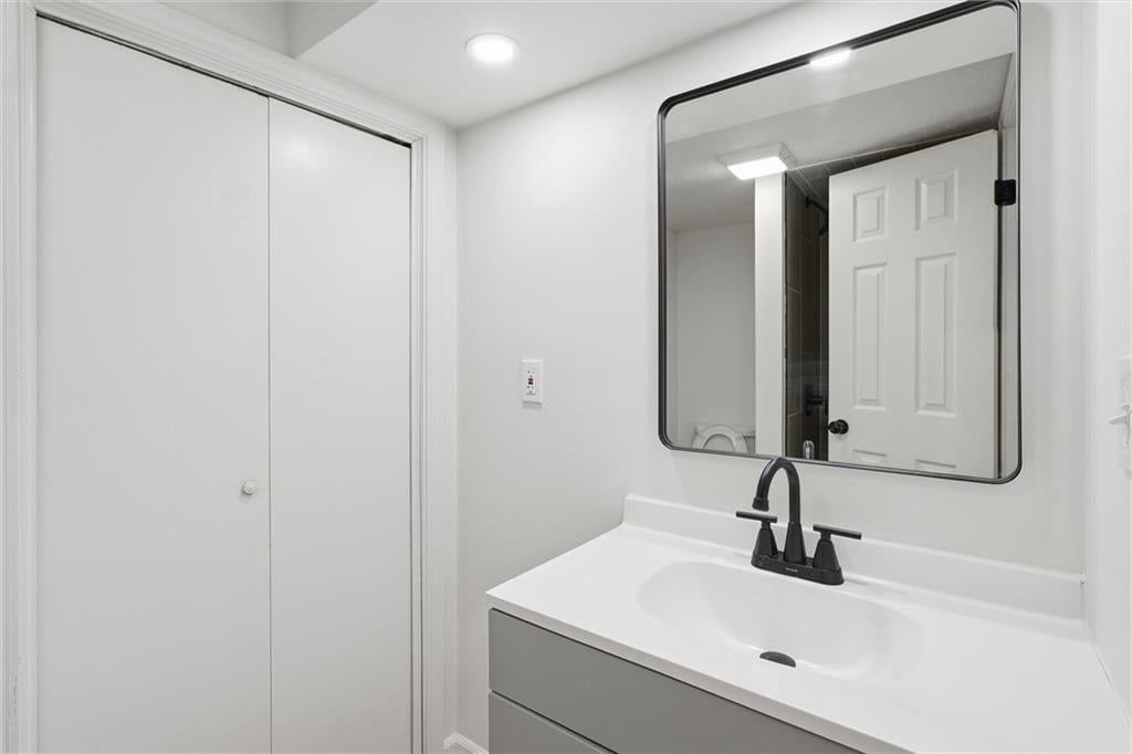 Black window frames and renovated bathrooms at 307B E Main Street, Smithville, MO 64089