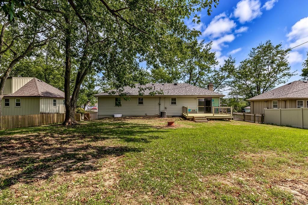 Big backyard, mature trees and flat lot at 11712 E 62nd Terrace, Kansas City, MO 64133