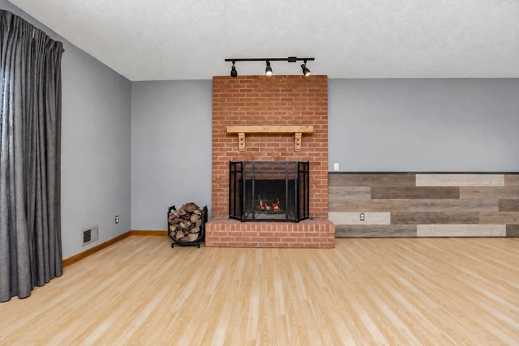 Fireplace and brick fireplace at 11712 E 62nd Terrace, Kansas City, MO 64133